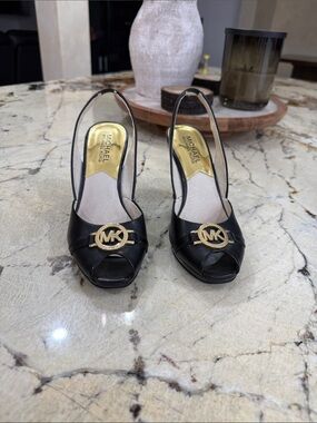 MICHAEL Michael Kors Black Peep-Toe Slingback Heels with Gold MK Medallion